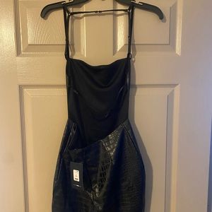 Selling this brand new fashion nova True Icon Feaux Leather Mini dress.